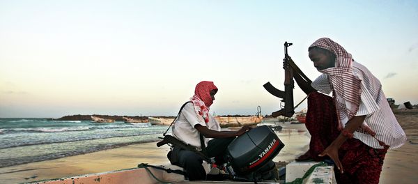 Somali pirates carrying out preparations to a skiff in Hobyo, northeastern Somalia. File photo Somali pirates carrying out preparations to a skiff in Hobyo, northeastern Somalia. File photo - Sputnik International