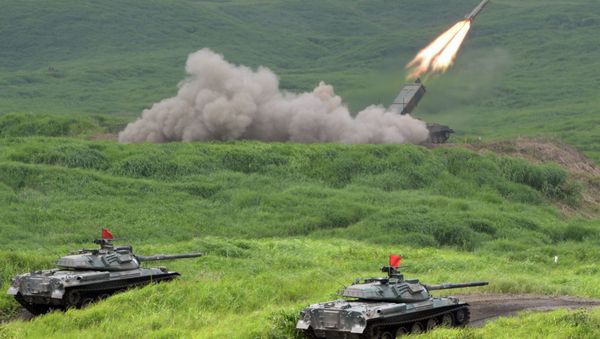 Japan Ground Self Defense Forces' type 92 anti-landmine missile fires while 74 tanks standing by during an exercise in its Higashi-Fuji training ground in Gotemba - Sputnik International