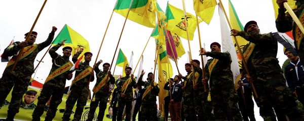 Members of the Hezbollah Brigade in Iraq, a Shiite movement supporting the Iraqi government forces in the ongoing clashes against Islamic State - Sputnik International