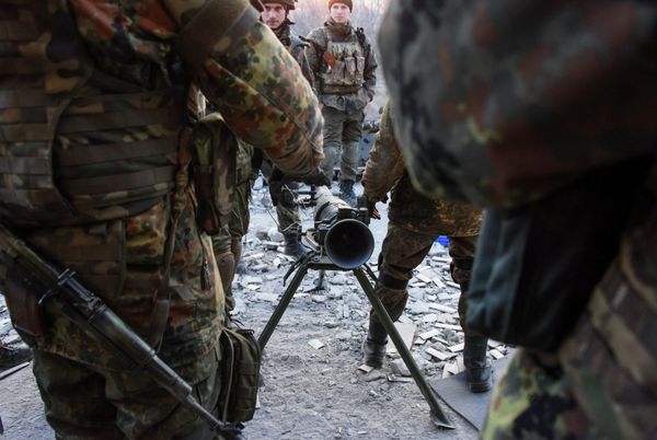 Fighters of the Azov Battalion prepare to fire an anti-tank weapon in the town of Shyrokyne on Sunday, March 23. Fighters of the Azov Battalion prepare to fire an anti-tank weapon in the town of Shyrokyne on Sunday, March 23. - Sputnik International