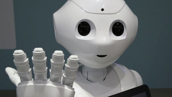 In this June 6, 2014 file photo, humanoid robot Pepper is on display at SoftBank mobile shop in Tokyo. Japanese mobile carrier Softbank said Tuesday, Feb. 10, 2015 it will incorporate artificial intelligence technology from IBM into its empathetic robot Pepper that goes on sale in Japan this month. In this June 6, 2014 file photo, humanoid robot Pepper is on display at SoftBank mobile shop in Tokyo. Japanese mobile carrier Softbank said Tuesday, Feb. 10, 2015 it will incorporate artificial intelligence technology from IBM into its empathetic robot Pepper that goes on sale in Japan this month. - Sputnik International