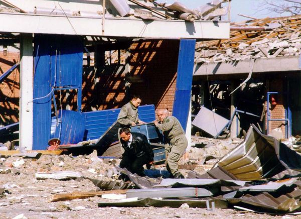 Workers clean the debris of a police training centre in Novi Sad, in the north of Yugoslavia 25 March 1999 which was destroyed during NATO air strikes, according to the official Yugoslav news agency, Tanjug. Workers clean the debris of a police training centre in Novi Sad, in the north of Yugoslavia 25 March 1999 which was destroyed during NATO air strikes, according to the official Yugoslav news agency, Tanjug. - Sputnik International