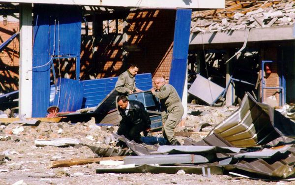 Workers clean the debris of a police training centre in Novi Sad, in the north of Yugoslavia 25 March 1999 which was destroyed during NATO air strikes, according to the official Yugoslav news agency, Tanjug. Workers clean the debris of a police training centre in Novi Sad, in the north of Yugoslavia 25 March 1999 which was destroyed during NATO air strikes, according to the official Yugoslav news agency, Tanjug. - Sputnik International