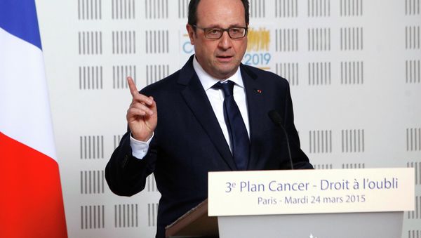 France's President Francois Hollande delivers a speech during a visit at the Ligue Contre le Cancer (League Against Cancer) centre in Paris, March 24, 2015. - Sputnik International