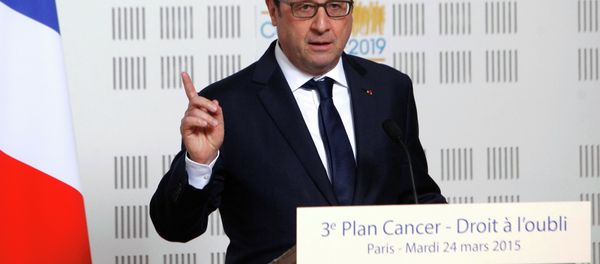 France's President Francois Hollande delivers a speech during a visit at the Ligue Contre le Cancer (League Against Cancer) centre in Paris, March 24, 2015. France's President Francois Hollande delivers a speech during a visit at the Ligue Contre le Cancer (League Against Cancer) centre in Paris, March 24, 2015. - Sputnik International