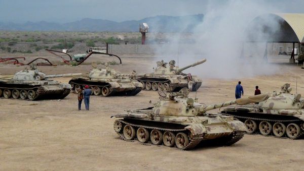 Militiamen loyal to Yemen's President Abed Rabbo Mansour Hadi take positions at the al-Anad air base in the southern province of Lahej, 60 kilometers (35 miles) of Aden, Yemen Militiamen loyal to Yemen's President Abed Rabbo Mansour Hadi take positions at the al-Anad air base in the southern province of Lahej, 60 kilometers (35 miles) of Aden, Yemen - Sputnik International