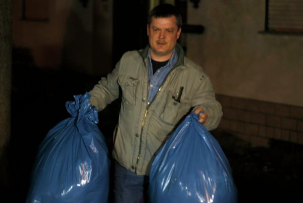 An investigator carries bags with items that have been collected in the house of the family of Andreas Lubitz in Montabaur, Germany An investigator carries bags with items that have been collected in the house of the family of Andreas Lubitz in Montabaur, Germany - Sputnik International