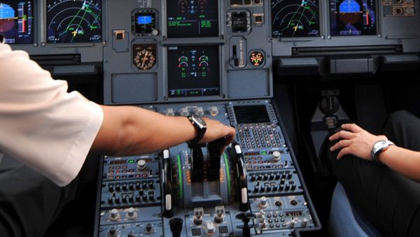 Pilots in the cockpit of an Airbus A320 File photo - Sputnik International