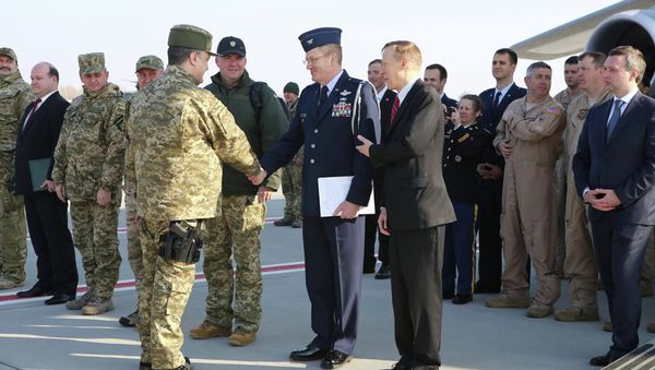 Ukraine's President Petro Poroshenko (L) during a welcome ceremony for first plane from United State with non-lethal aid including ten Humvee vehicles to Ukraine at Borispol airport near Kiev Ukraine's President Petro Poroshenko (L) during a welcome ceremony for first plane from United State with non-lethal aid including ten Humvee vehicles to Ukraine at Borispol airport near Kiev - Sputnik International