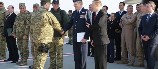 Ukraine's President Petro Poroshenko (L) during a welcome ceremony for first plane from United State with non-lethal aid including ten Humvee vehicles to Ukraine at Borispol airport near Kiev Ukraine's President Petro Poroshenko (L) during a welcome ceremony for first plane from United State with non-lethal aid including ten Humvee vehicles to Ukraine at Borispol airport near Kiev - Sputnik International