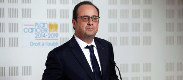 France's President Francois Hollande delivers a speech during a visit at the Ligue Contre le Cancer (League Against Cancer) centre in Paris, March 24, 2015. France's President Francois Hollande delivers a speech during a visit at the Ligue Contre le Cancer (League Against Cancer) centre in Paris, March 24, 2015. - Sputnik International