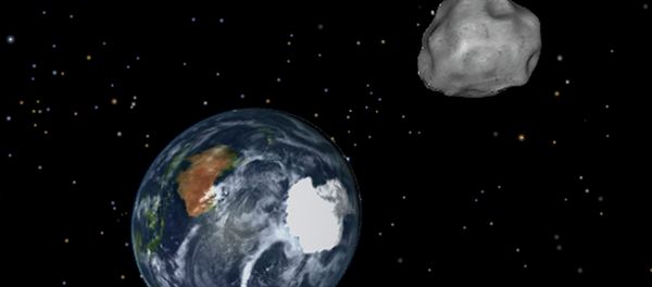 This image provided by NASA/JPL-Caltech shows a simulation of asteroid 2012 DA14 approaching from the south as it passes through the Earth-moon system on Friday, Feb. 15, 2013 This image provided by NASA/JPL-Caltech shows a simulation of asteroid 2012 DA14 approaching from the south as it passes through the Earth-moon system on Friday, Feb. 15, 2013 - Sputnik International