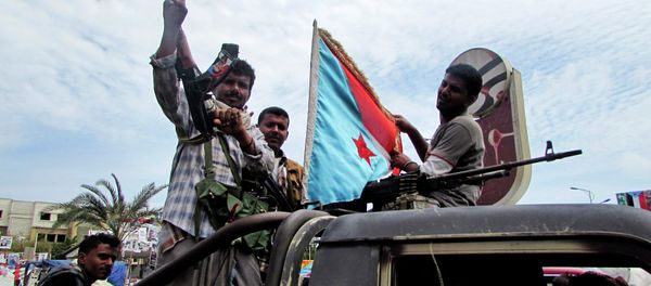 In this Friday, March 20, 2015 file photo, militiamen loyal to President Abed Rabbo Mansour Hadi ride on an army vehicle on a street in Aden, Yemen - Sputnik International