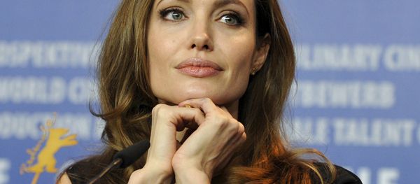 U.S. actress and director Angelina Jolie attends a news conference to promote the movie The Land Of Blood And Honey at the 62nd Berlinale International Film Festival in Berlin in this February 11, 2012 file photo - Sputnik International