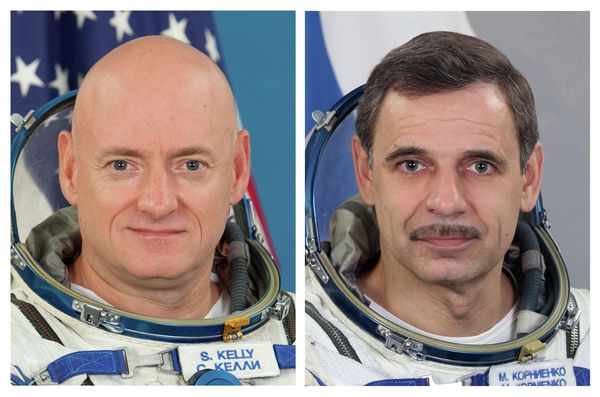 NASA astronaut Scott Kelly, left, and Russian cosmonaut Mikhail Kornienko - Sputnik International