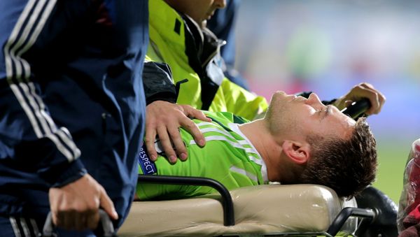 Euro 2016 Group G qualifier between Russia and Montenegro was suspended after Russian goalkeeper was hit by a flare Euro 2016 Group G qualifier between Russia and Montenegro was suspended after Russian goalkeeper was hit by a flare - Sputnik International