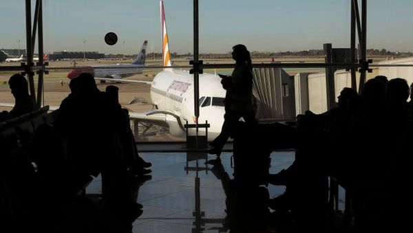 Passengers wait to board a Germanwings flight in Barcelona's El Prat airport March 27, 2015 - Sputnik International