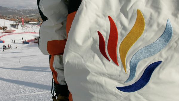 A volunteer stands on the downhill course that's part of the 16th Winter Deaflympics at Park City Mountain Resort. - Sputnik International