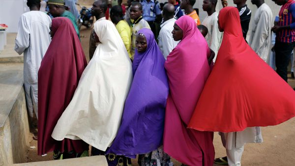 Nigerians wait for to register before voting in Jere, some 60 kilometers (40 miles) from the capital Abuja, Nigeria Saturday, March 28, 2015 - Sputnik International