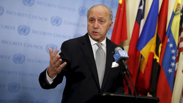 French Foreign Minister Laurent Fabius speaks to members of the media as he stands outside the United Nations Security Council chambers French Foreign Minister Laurent Fabius speaks to members of the media as he stands outside the United Nations Security Council chambers - Sputnik International