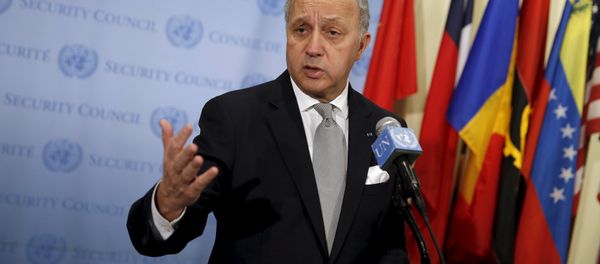 French Foreign Minister Laurent Fabius speaks to members of the media as he stands outside the United Nations Security Council chambers French Foreign Minister Laurent Fabius speaks to members of the media as he stands outside the United Nations Security Council chambers - Sputnik International