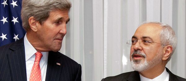 US Secretary of State John Kerry (L) and Iran's Foreign Minister Mohammad Javad Zarif pose for a photograph before resuming talks over Iran's nuclear programme in Lausanne US Secretary of State John Kerry (L) and Iran's Foreign Minister Mohammad Javad Zarif pose for a photograph before resuming talks over Iran's nuclear programme in Lausanne - Sputnik International