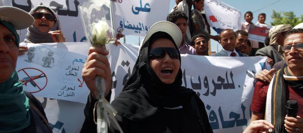 A Yemeni woman shouts slogans during a rally against Saudi-led coalition airstrikes against Huthi rebels on March 29, 2015 in Sanaa A Yemeni woman shouts slogans during a rally against Saudi-led coalition airstrikes against Huthi rebels on March 29, 2015 in Sanaa - Sputnik International