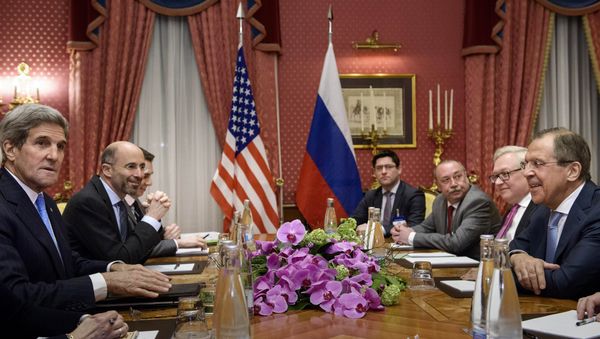 US Secretary of State John Kerry, left, and Russian Foreign Minister Sergey Lavrov, right, wait for the start of a meeting at the Beau Rivage Palace Hotelin Lausanne, Switzerland US Secretary of State John Kerry, left, and Russian Foreign Minister Sergey Lavrov, right, wait for the start of a meeting at the Beau Rivage Palace Hotelin Lausanne, Switzerland - Sputnik International