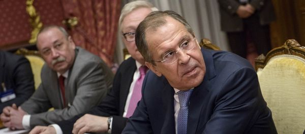 Russian Foreign Minister Sergei Lavrov (R) waits for a meeting with US Secretary of State John Kerry at the Beau Rivage Palace Hotel in Lausanne, Switzerland Russian Foreign Minister Sergei Lavrov (R) waits for a meeting with US Secretary of State John Kerry at the Beau Rivage Palace Hotel in Lausanne, Switzerland - Sputnik International