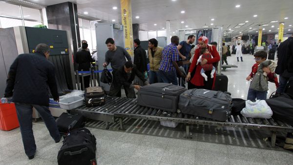 Travelers pass through security at Sanaa International Airport as hundreds of foreigners were evacuated from the Yemeni capital due to security reasons on March 28, 2015 Travelers pass through security at Sanaa International Airport as hundreds of foreigners were evacuated from the Yemeni capital due to security reasons on March 28, 2015 - Sputnik International