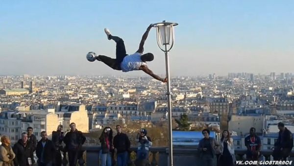 Football - Freestyle on lamp post - Sputnik International