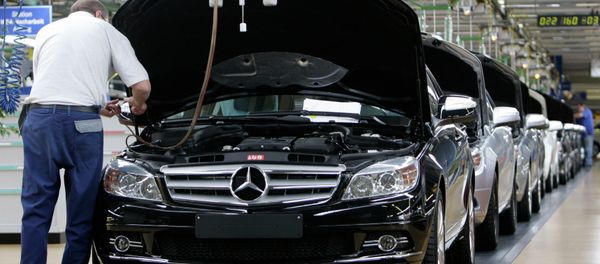 An employee of German car producer Mercedes-Benz controling a Mercedes C-class as it rolls off the production line in the plant in Sindelfingen near Stuttgart, Germany An employee of German car producer Mercedes-Benz controling a Mercedes C-class as it rolls off the production line in the plant in Sindelfingen near Stuttgart, Germany - Sputnik International