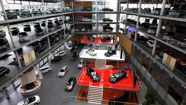 Mercedes-Benz cars are displayed in a dealership of German car manufacturer Daimler in Munich Mercedes-Benz cars are displayed in a dealership of German car manufacturer Daimler in Munich - Sputnik International