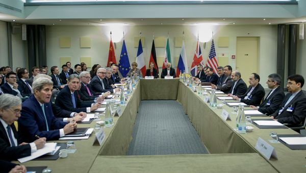 Officials wait for a meeting with officials from P5+1, the European Union and Iran at the Beau Rivage Palace Hotel March 31, 2015 in Lausanne. Officials wait for a meeting with officials from P5+1, the European Union and Iran at the Beau Rivage Palace Hotel March 31, 2015 in Lausanne. - Sputnik International