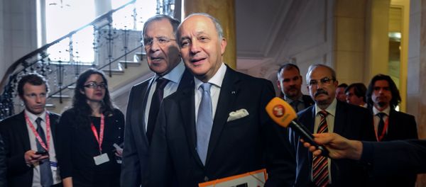 French Foreign Minister Laurent Fabius (C-R) and Russian Foreign Minister Sergei Lavrov arrive for a bilateral meeting in Lausanne during Iran nuclear talks French Foreign Minister Laurent Fabius (C-R) and Russian Foreign Minister Sergei Lavrov arrive for a bilateral meeting in Lausanne during Iran nuclear talks - Sputnik International