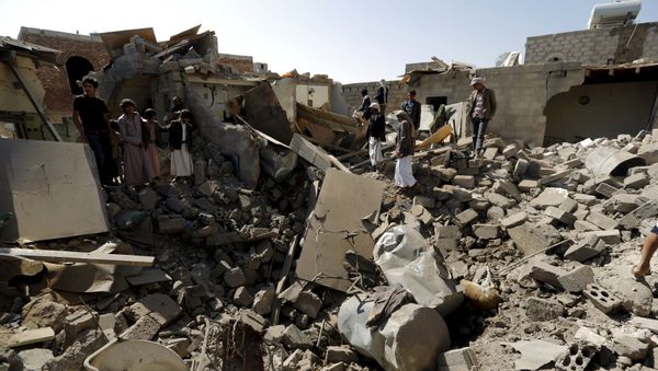 The rubble of houses destroyed by an air strike near Sanaa Airport The rubble of houses destroyed by an air strike near Sanaa Airport - Sputnik International