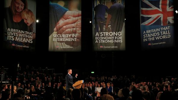 Britain's Prime Minister and leader of the Conservative Party, David Cameron, gestures during his keynote speech at the party's spring forum in Manchester, northern England Britain's Prime Minister and leader of the Conservative Party, David Cameron, gestures during his keynote speech at the party's spring forum in Manchester, northern England - Sputnik International