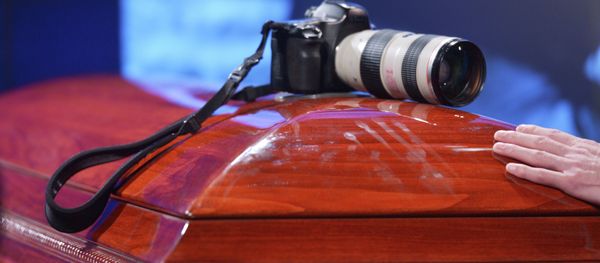 Mourning ceremony for the late photo journalist Andrei Stenin at the Rossiya Segodnya agency's press center. - Sputnik International