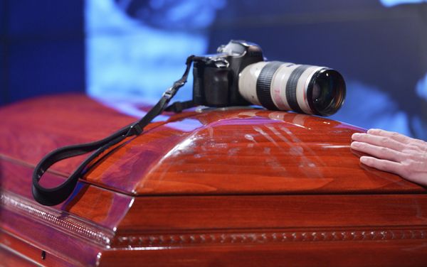 Mourning ceremony for the late photo journalist Andrei Stenin at the Rossiya Segodnya agency's press center. - Sputnik International