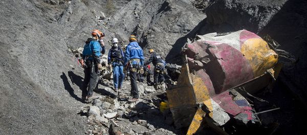 French emergency rescue services work among debris of the Germanwings passenger jet at the crash site near Seyne-les-Alpes, France - Sputnik International
