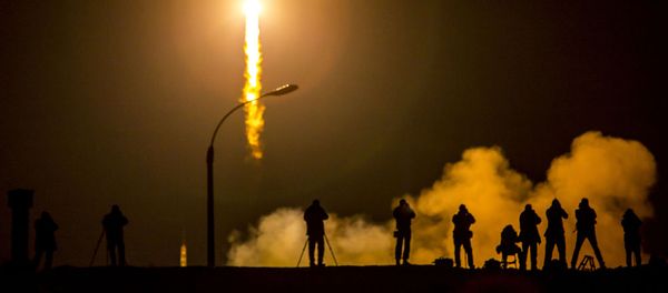 Media photograph the Soyuz TMA-16M spacecraft is seen as it launches to the International Space Station with Expedition 43 NASA Astronaut Scott Kelly, Russian Cosmonauts Mikhail Kornienko, and Gennady Padalka of the Russian Federal Space Agency (Roscosmos) onboard Saturday, March 28, 2015, Kazakh time (March 27 Eastern time) from the Baikonur Cosmodrome in Kazakhstan. As the one-year crew, Kelly and Kornienko will return to Earth on Soyuz TMA-18M in March 2016 Media photograph the Soyuz TMA-16M spacecraft is seen as it launches to the International Space Station with Expedition 43 NASA Astronaut Scott Kelly, Russian Cosmonauts Mikhail Kornienko, and Gennady Padalka of the Russian Federal Space Agency (Roscosmos) onboard Saturday, March 28, 2015, Kazakh time (March 27 Eastern time) from the Baikonur Cosmodrome in Kazakhstan. As the one-year crew, Kelly and Kornienko will return to Earth on Soyuz TMA-18M in March 2016 - Sputnik International