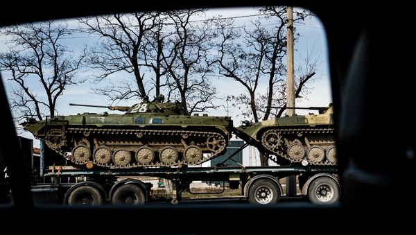 Armour Personnel Carriers loaded on a truck in the eastern Ukrainian city of Donetsk. Armour Personnel Carriers loaded on a truck in the eastern Ukrainian city of Donetsk. - Sputnik International