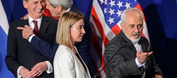 (Ftom L) British Foreign Secretary Philip Hammond, US Secretary of State John Kerry, EU's foreign policy chief Federica Mogherini and Iranian Foreign Minister Mohammad Javad Zarif arrive prior to the announcement of an agreement on Iran nuclear talks on April 2, 2015 (Ftom L) British Foreign Secretary Philip Hammond, US Secretary of State John Kerry, EU's foreign policy chief Federica Mogherini and Iranian Foreign Minister Mohammad Javad Zarif arrive prior to the announcement of an agreement on Iran nuclear talks on April 2, 2015 - Sputnik International