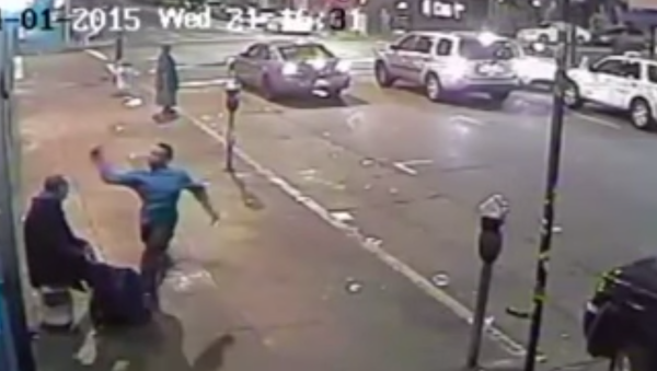 “Pulls out a blunt metal object and, almost like a baseball swing, swings it across the left side of the victim’s head, knocking him unconscious.” - Sputnik International