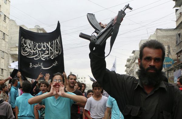 Supporters of the Al Nusra Front take part in a protest against Syrian President Bashar al-Assad and the international coalition in Aleppo on September 26, 2014 Supporters of the Al Nusra Front take part in a protest against Syrian President Bashar al-Assad and the international coalition in Aleppo on September 26, 2014 - Sputnik International