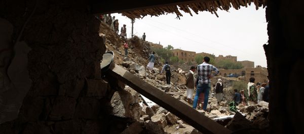 Yemenis inspect the rubble of destroyed houses in the village of Bani Matar, 70 kilometers (43 miles) West of Sanaa, on April 4, 2015 Yemenis inspect the rubble of destroyed houses in the village of Bani Matar, 70 kilometers (43 miles) West of Sanaa, on April 4, 2015 - Sputnik International