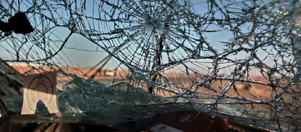 Windscreen of a car after an air strike in Ras Lanuf Windscreen of a car after an air strike in Ras Lanuf - Sputnik International