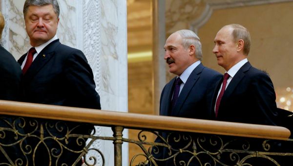 Ukrainian President Petro Poroshenko, left, is followed by Russian President Vladimir Putin, right, and Belarusian President Alexander Lukashenko, heading for a broader meeting involving senior officials in Minsk, Belarus, Wednesday, Feb. 11, 2015 - Sputnik International