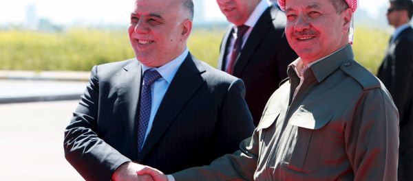 Iraqi Kurdish regional President Massoud Barzani (R) shakes hands with Iraqi Prime Minister Haider al-Abadi at Arbil International Airport April 6, 2015 Iraqi Kurdish regional President Massoud Barzani (R) shakes hands with Iraqi Prime Minister Haider al-Abadi at Arbil International Airport April 6, 2015 - Sputnik International