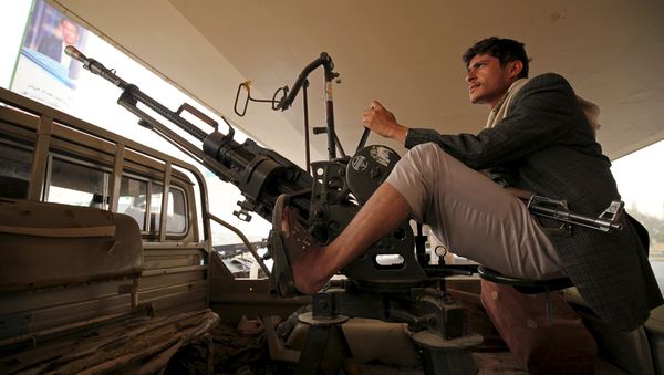 A Houthi fighter mans a weapon on a patrol truck as he guards the site of a demonstration against Saudi-led coalition airstrikes, in Sanaa April 3, 2015 A Houthi fighter mans a weapon on a patrol truck as he guards the site of a demonstration against Saudi-led coalition airstrikes, in Sanaa April 3, 2015 - Sputnik International